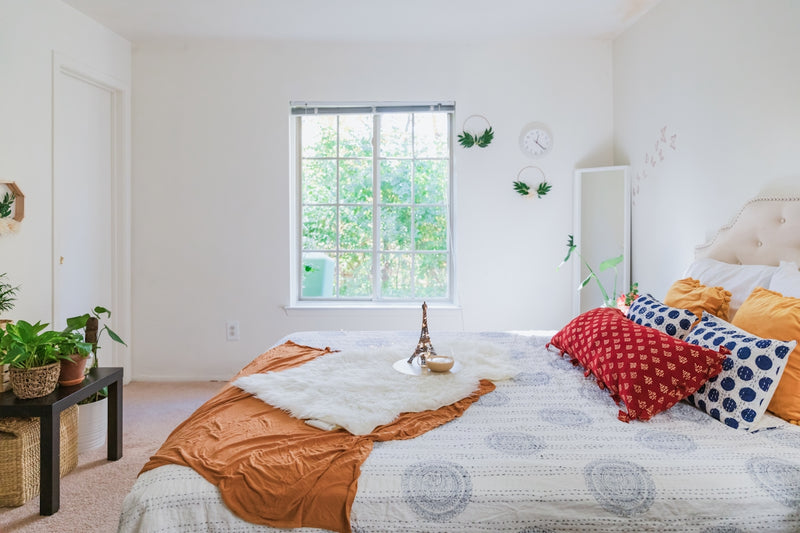 white and red floral bed linen