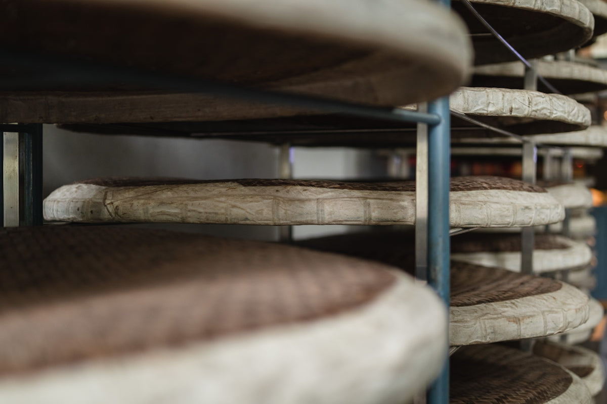 a close up of a bunch of bread on a rack