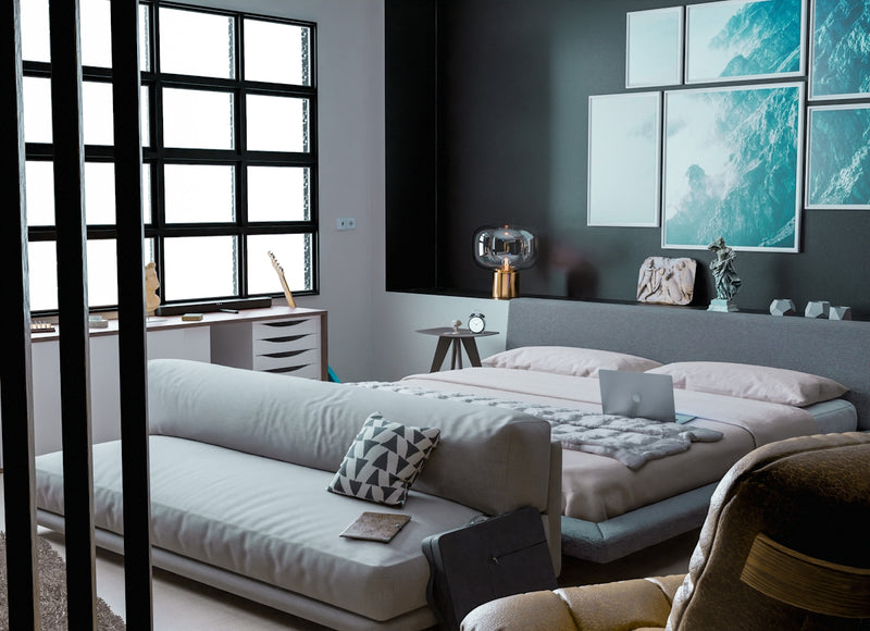 a bedroom with a large window