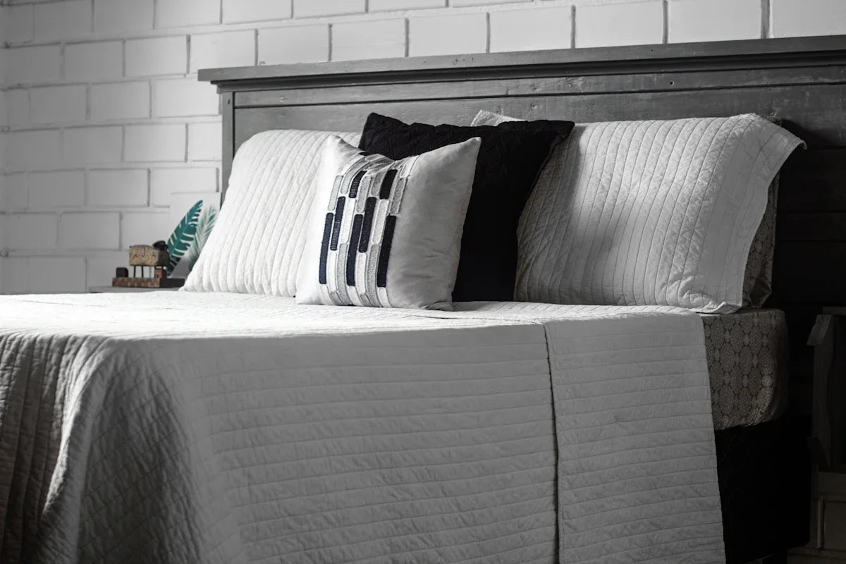 a bed with pillows