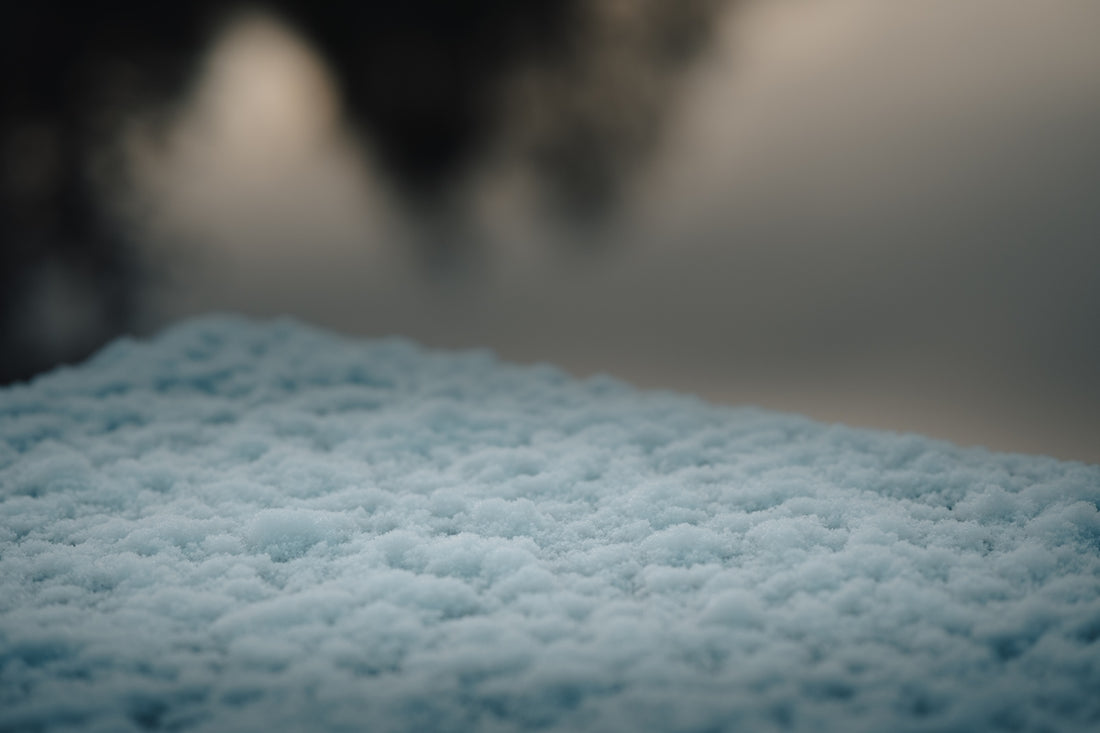 A close up of a bed with a sky background