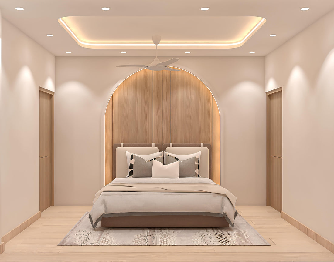 A modern bedroom with a stylish, neutral aesthetic