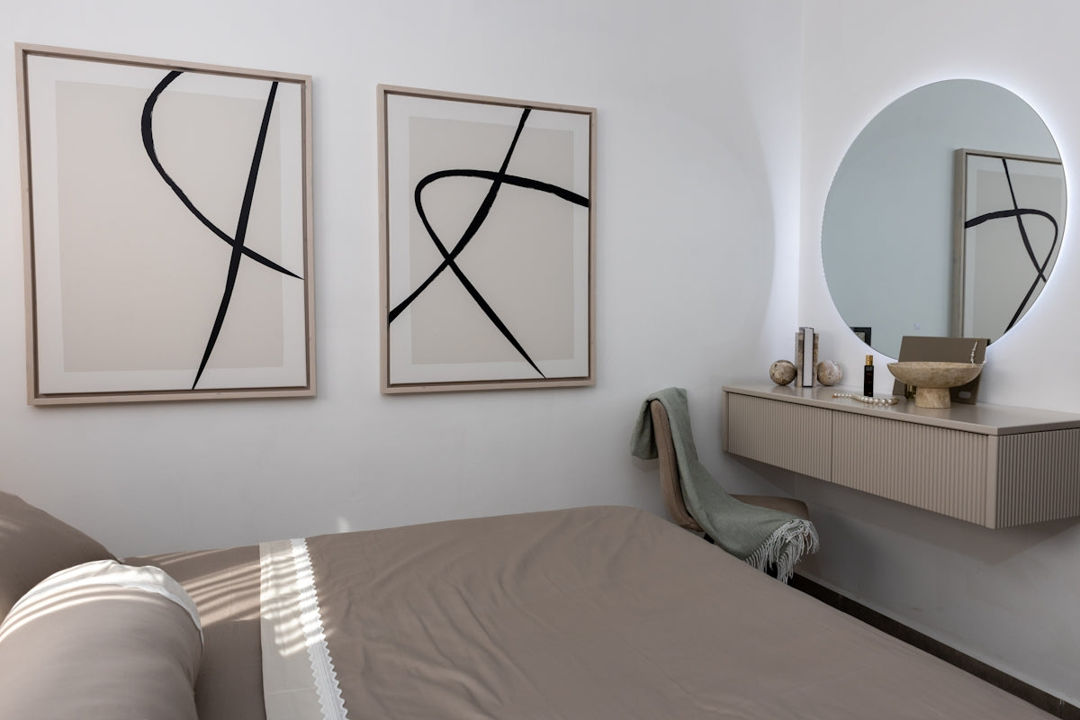 Minimalist bedroom with abstract art and vanity