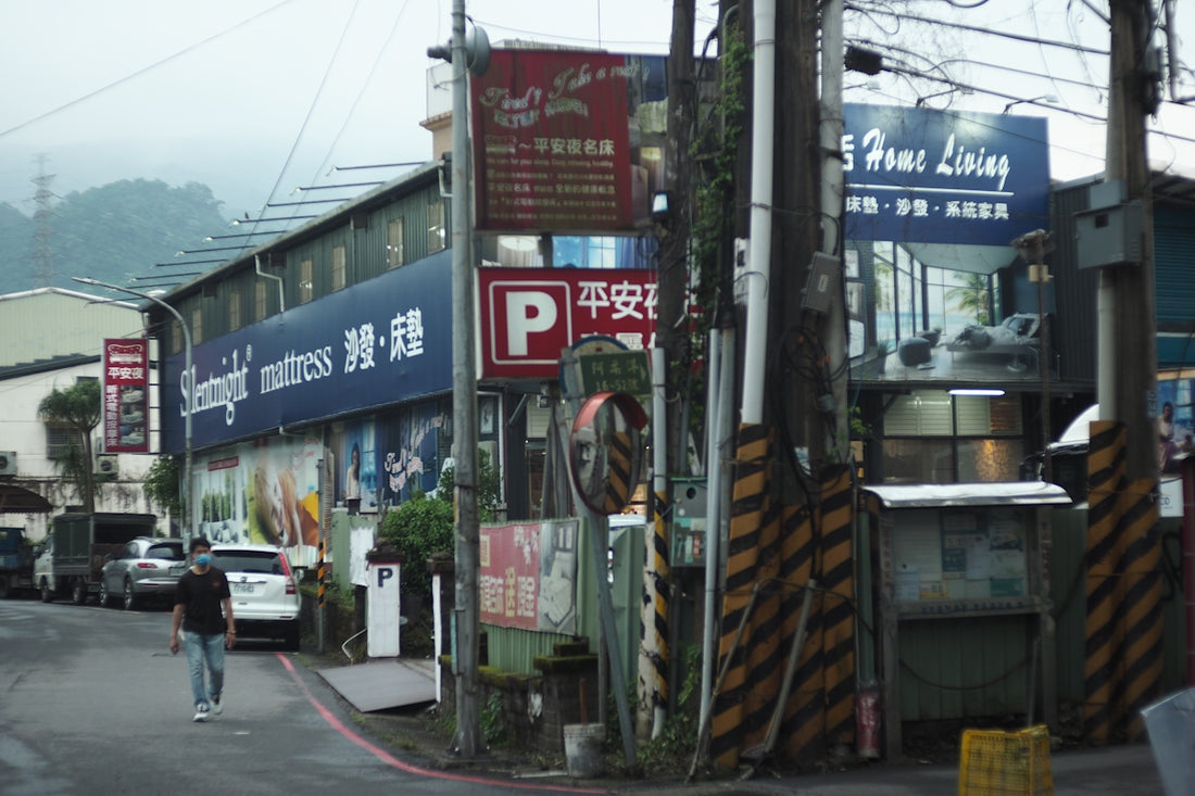 Street scene with buildings and parked cars