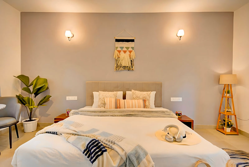 A modern bedroom with a comfortable bed and stylish decor.